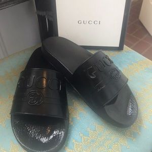 Gucci women’s black slides